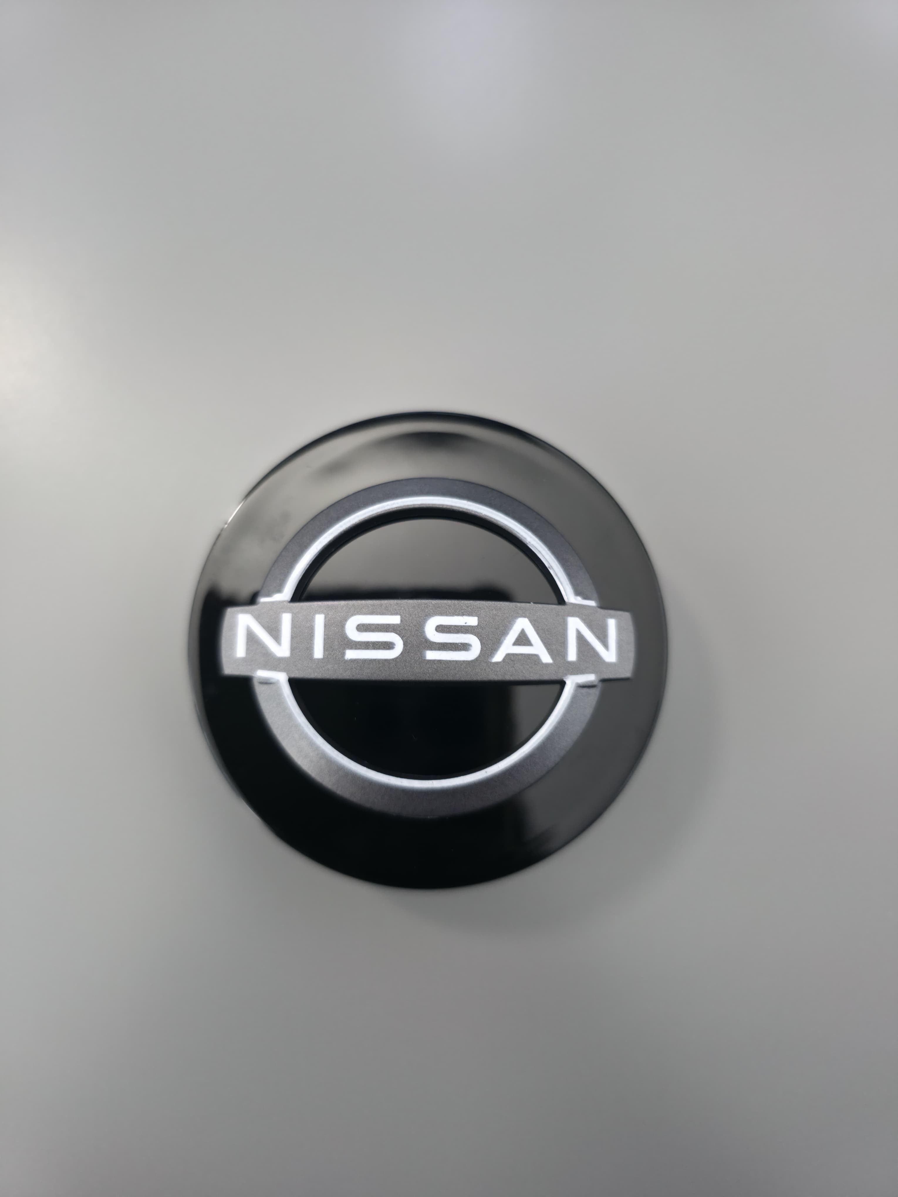 Tapas de rueda central Nissan 54mm