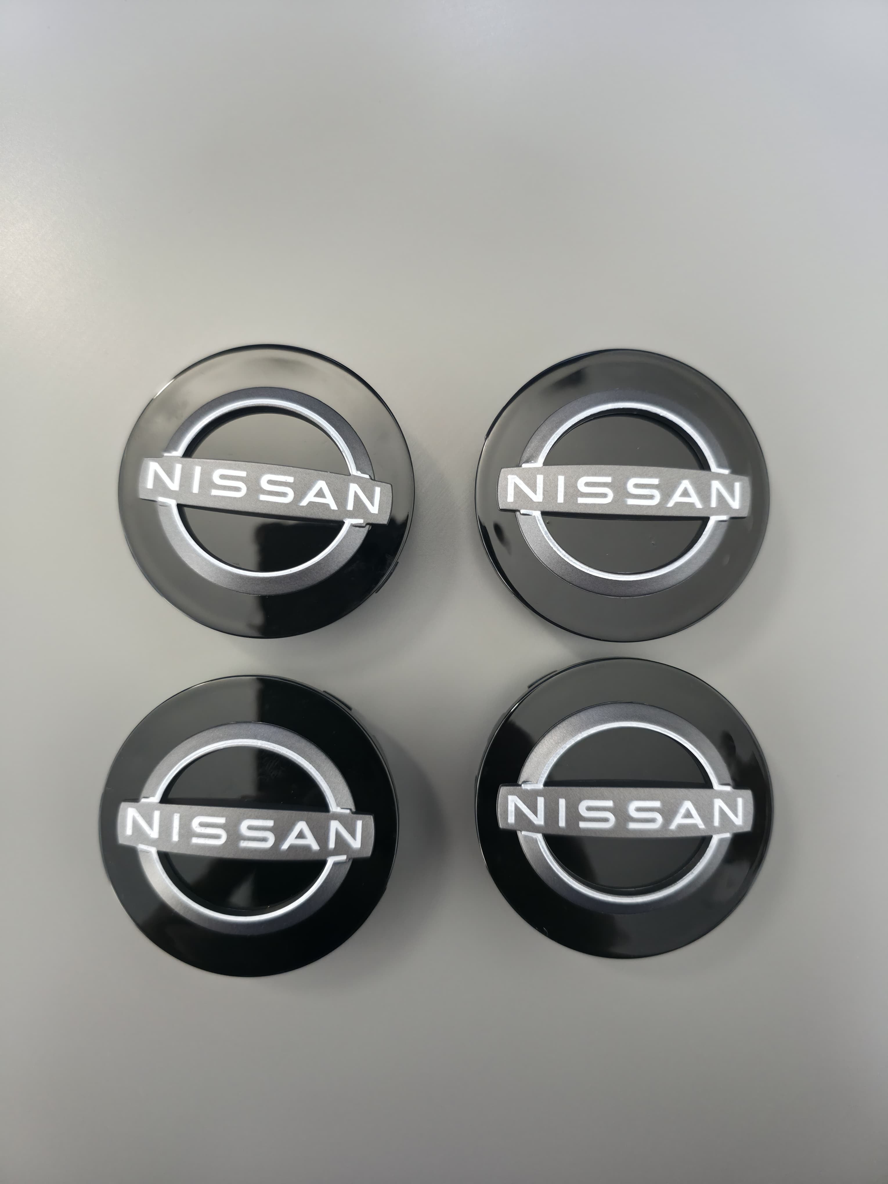 Tapas de rueda central Nissan 54mm